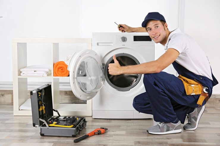 plumber repairing washing machine 392895 4242.jpg